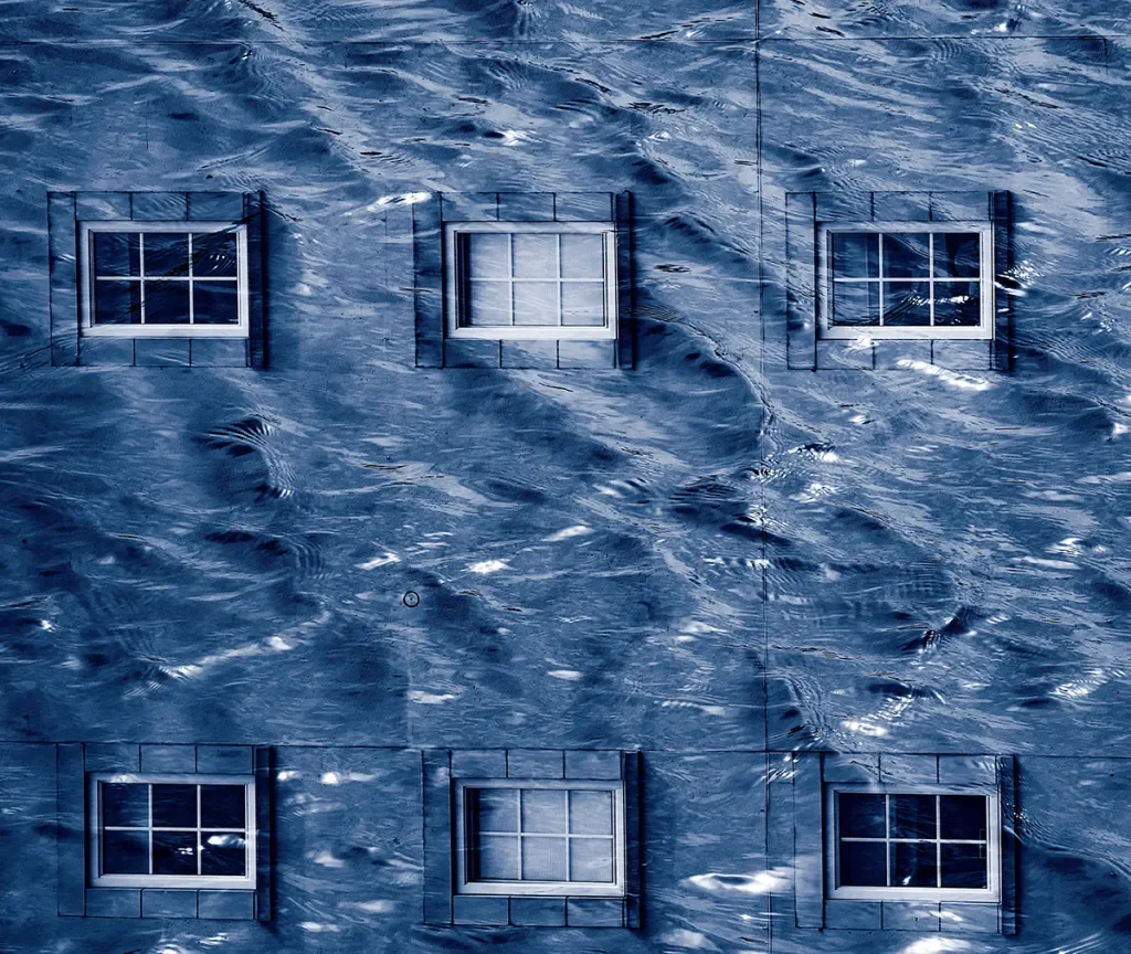 multiple exposure of a marina water scene with a close up of a building showing six windows