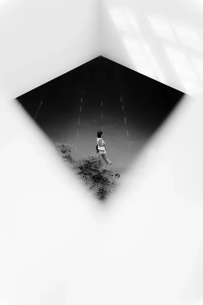 surreal architectural photograph looking through a diamond shape gap