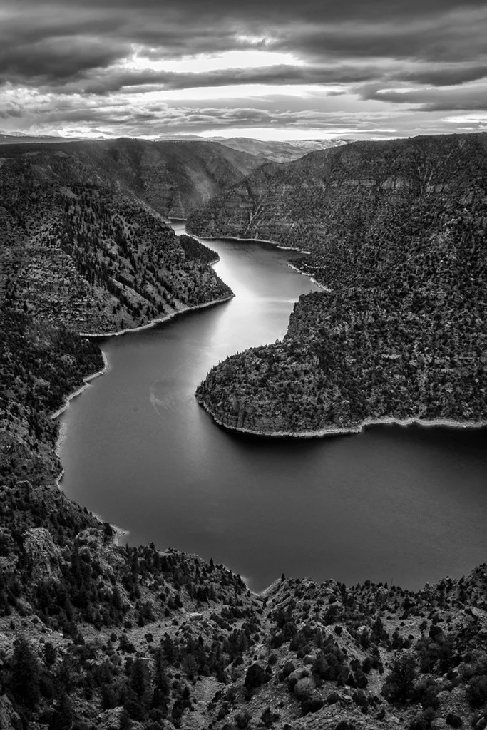 black and white landscape photo of a large river