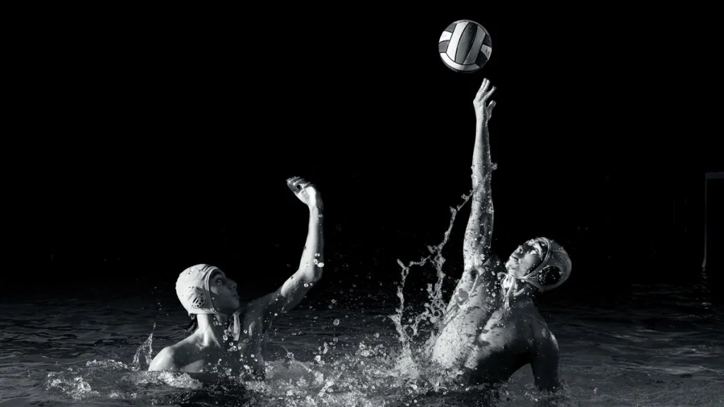 black and white photo of waterpolo players