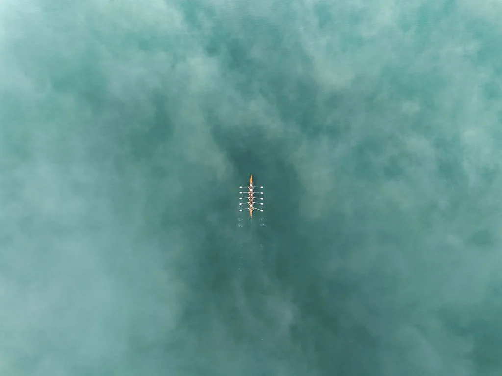 Aerial view of kayakers in calm water