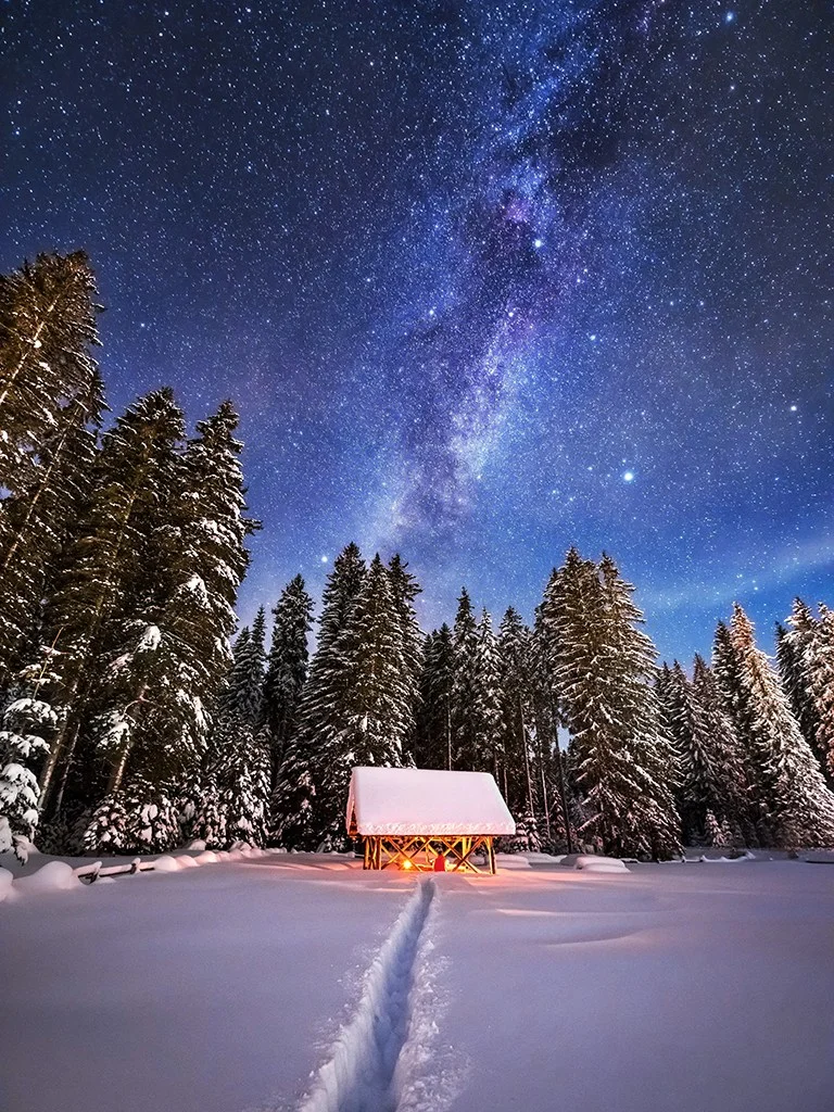 Night scene with a hut under the Milky Way