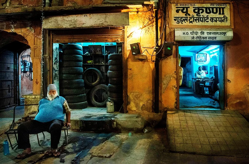 Portrait of two men at night on a street