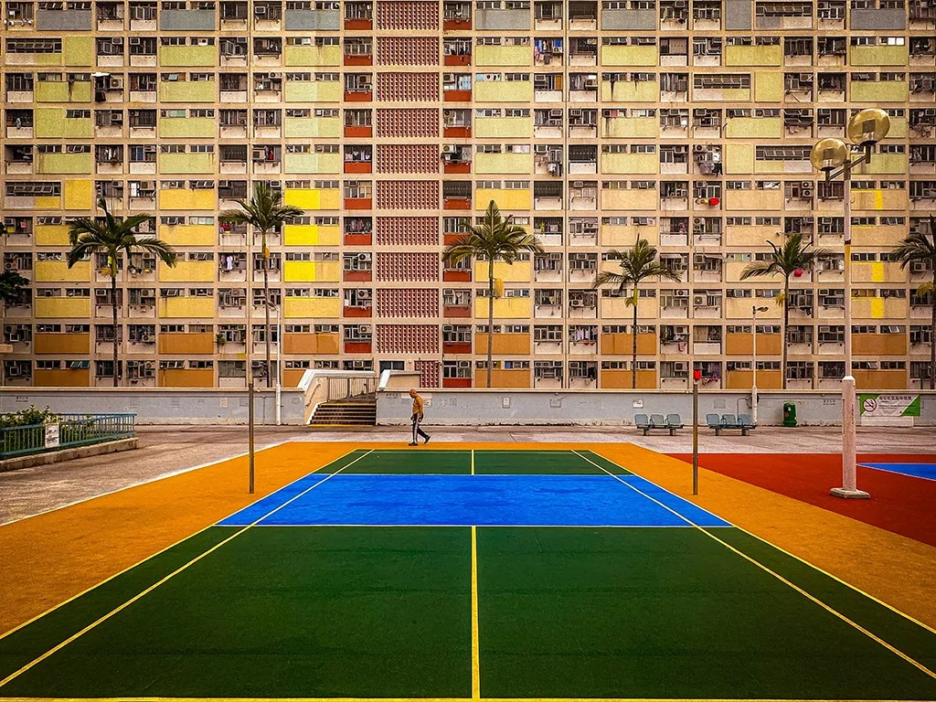 hong kong estate with colourful sports court