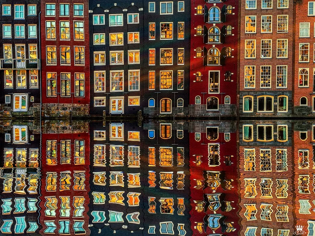 buildings at dusk in Amsterdam reflection