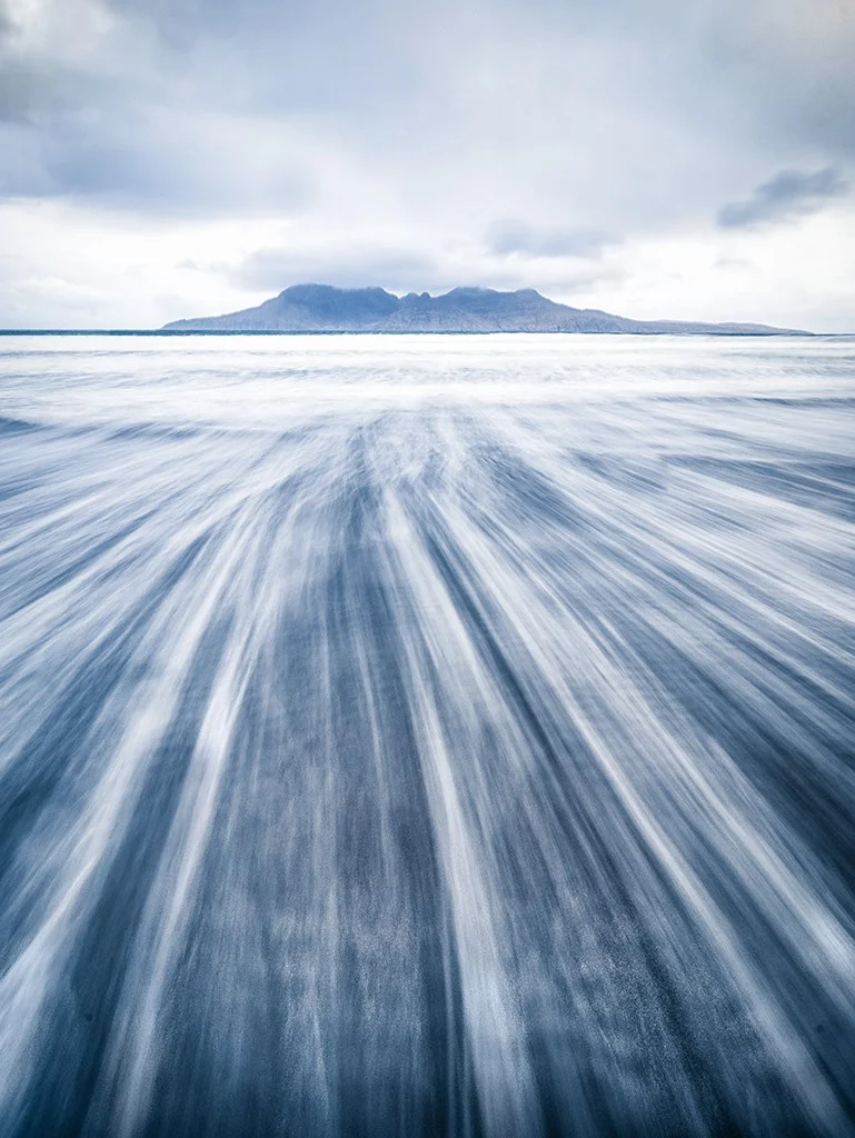 rush of water leading to island of Rum