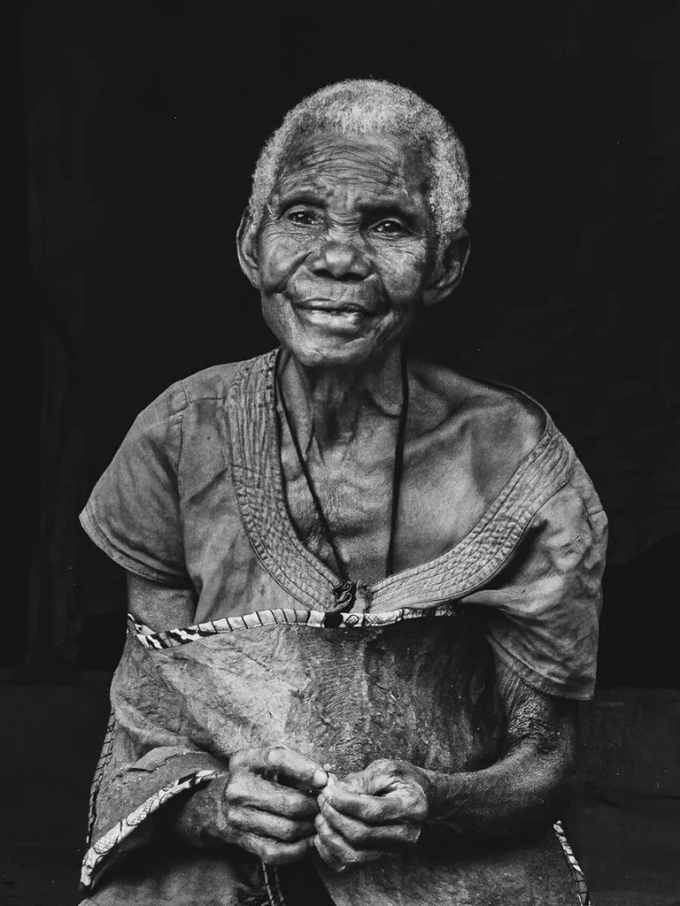 Elderly woman in a black and white portrait