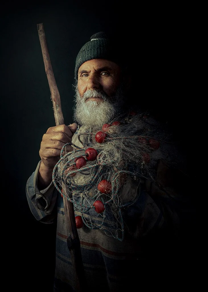 Atmospheric portrait of a fisherman