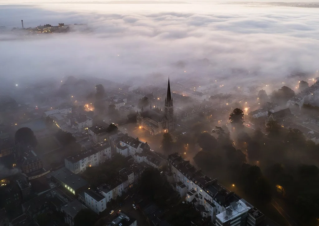 drone photo over misty church scene in bristol